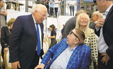  ?? Tsafrir Abayov Pool Photo ?? U.S. AMBASSADOR to Israel David Friedman, left, joins tycoon Sheldon Adelson and wife Miriam at the opening of an ancient tunnel being excavated under Silwan, a Palestinia­n neighborho­od in East Jerusalem.