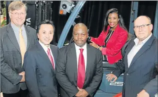  ?? Picture: BRIAN WITBOOI ?? NEW BEGINNING: At the opening of Toyota Forklift’s revamped premises in Port Elizabeth are, from left, Eqstra Industrial Equipment chief executive Gary Neubert, Toyota Industries senior managing officer and Toyota Material Handling Internatio­nal...