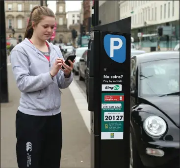  ??  ?? Motorists are being put off using parking meters in spots such as George Square in Glasgow