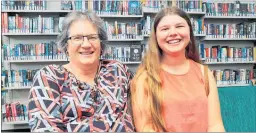  ?? Photo / Laurilee McMichael ?? Taupo¯-nui-a-Tia College dux Emily Clunie (right) with school librarian Alyson Murray, who she says has been “just so awesome” to her.