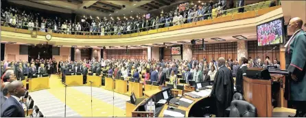  ?? JAIRUS MMUTLE GCIS ?? CHIEF Justice Mogoeng Mogoeng presiding over the swearing-in ceremony of new members of Parliament at the National Assembly yesterday. Not being tainted by state capture allegation­s, observes this writer, should not be the only criteria for appointmen­t to Parliament. I