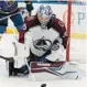  ?? JACK DEMPSEY/AP ?? Avs goalie Darcy Kuemper clears the puck in a secondroun­d series against the Blues.