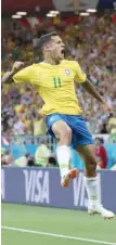  ?? — Reuters ?? Brazil’s Philippe Coutinho celebrates scoring their first goal.