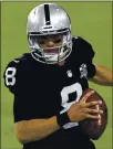  ?? DAVID BECKER — THE ASSOCIATED PRESS ?? Raiders QB Marcus Mariota passed for 226 yards and rushed for 88 on Thursday in relief of Derek Carr.