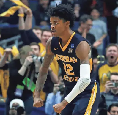  ??  ?? Murray State's Ja Morant (12) is expected to be drafted by the Grizzlies at No. 2 overall. FILE / ELISE AMENDOLA