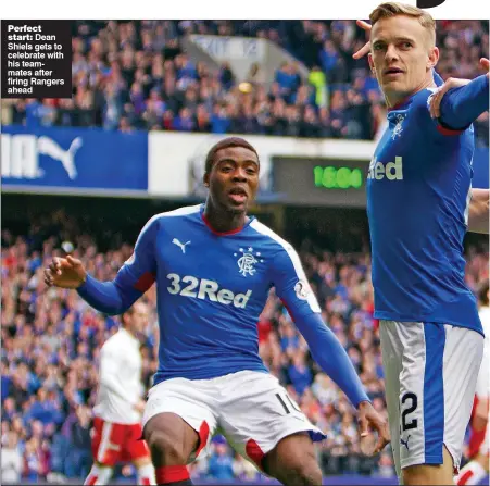  ??  ?? Perfect start: Dean Shiels gets to celebrate with his teammates after firing Rangers ahead