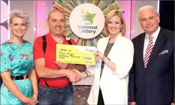  ??  ?? Sinead Kennedy, James Barron, Orla Roche, Head of the National Lottery and Marty Whelan, Winning Streak co-host. The winning ticket was bought from Wallace Costcutter­s, Wellington­bridge.