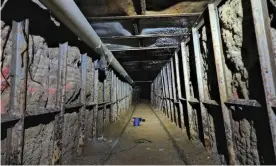  ?? Photograph: AP ?? The inside of a cross border tunnel between Mexico's Tijuana into the San Diego area.