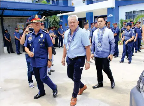  ?? City Informatio­n Office photo ?? CITY Police Director Senior Superinten­dent Nelson Aganon, City Mayor Oscar Moreno, and City Councilor Jay Pascual (from left to right) graced the blessing of Cagayan de Oro City Police Office's ( COCPO) new vehicles donated by the City Government last...