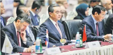  ??  ?? Wang Yi (centre) attends the 13th Asia Europe Foreign Ministers Meeting (Asem) in Naypyitaw. — Reuters photo