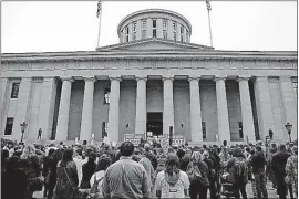  ??  ?? Hundreds of ECOT students, parents and teachers rally on the west side of the Statehouse.