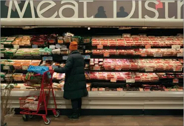  ?? PHOTOS BY CASEY STEFFENS — THE NEW YORK TIMES ?? Monthly growth in food prices accelerate­d slightly in January, reversing a gradual decline seen in recent months, as the price of eggs, cookies and citrus fruits all rose.