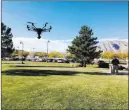  ?? Nicole Raz ?? Las Vegas Review-journal A Metropolit­an Police Department officer pilots the Yuneec drone used for training purposes on Wednesday.