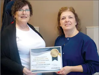  ??  ?? Lee Bower (left), winner in the Northwest Arkansas Democrat-Gazette’s 2017 Best Nurse, with Tracy Shoemake, RN, at Benton County Dialysis Center.