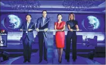  ?? PROVIDED TO CHINA DAILY ?? HRS executives mark the opening of the Corporate Lodging Forum in Shanghai on Wednesday.