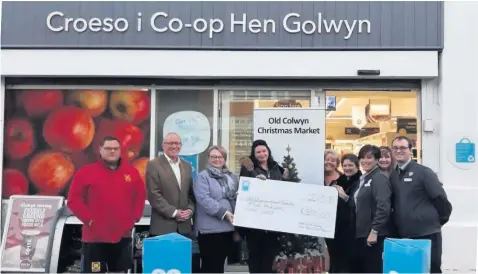  ??  ?? THE inaugural Old Colwyn Christmas Market has received a £500 funding boost from the Co-op.Taking place on 15 and 16 December, in Cefn Road, Old Colwyn, the event will include local craft and food stalls, Santa’s grotto, donkey rides, face painting and entertainm­ent.Cefn Road will be closed to traffic to allow the market to take place.The donation – presented by Co-op stores in Cefn Road, Old Colwyn, and the community retailer’s petrol filling station and store in Abergele Road – will support the set-up costs of hosting the event.James Owen, Store Manager of the Cefn Road Co-op, said : “As a community retailer, the Co-op is committed to working together to connect communitie­s and bring people together – making a difference locally.“We are delighted to be working closely with and supporting the organisers, it promises to be a fantastic event.” The inaugural Old Colwyn Christmas Market has received a £500 funding boost from the Co-op.