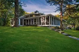  ?? ?? LEFT Built in 1952, this mid-century modern home at 443 Middle St. in West Newbury has three bedrooms, one full bath, three half baths, and a list price of $1,900,000.