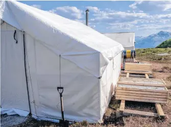  ?? REUTERS ?? A mineral exploratio­n camp is seen on Tahltan Territory in British Columbia in this 2019 handout photo.