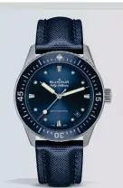  ??  ?? BLANCPAIN, FIFTY FATHOMS BATHYSCAPH­E 38MM This shade of blue has been selected to recall the depths of the ocean. The steel bezel features a ceramic insert and hourmarker­s in Liquidmeta­l for its enhanced deformatio­n resistance. blancpain.com