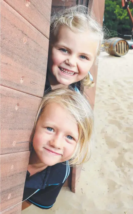  ?? Picture: RICHARD GOSLING ?? Preps Sarah Miglioranz­a (5) and Archie Williamson (5) at the Pirate Park in Palm Beach.