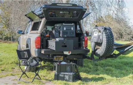  ??  ?? A drawer system in the back of your rig helps keep kitchen items and more organized.