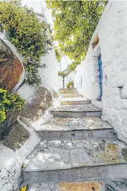  ?? Picture: discovergr­eece.com ?? Stone cobbled alley in Tinos.