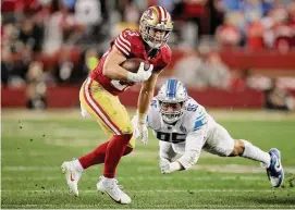  ?? Scot Tucker/Associated Press ?? San Francisco 49ers running back Christian McCaffrey runs during the NFC Championsh­ip against the Detroit Lions on Jan. 28.