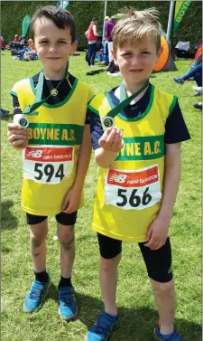  ??  ?? Alex Robertson and Lorcan Forde Dunne show off their medals at the Leinster Championsh­ips.