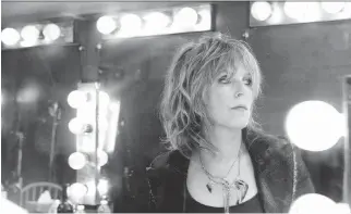  ??  ?? Lucinda Williams has released a new live album that’s a collection of hard-luck stories delivered in her unmistakab­ly passionate voice, equal parts granite and velvet. The songs are both timeless and contempora­ry.