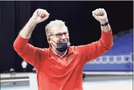  ?? Elsa / Getty Images ?? UConn women’s basketball head coach Geno Auriemma celebrates the Huskies’ 69-67 win over the Baylor Lady Bears during the Elite Eight round of the NCAA Women’s Basketball Tournament on Monday.