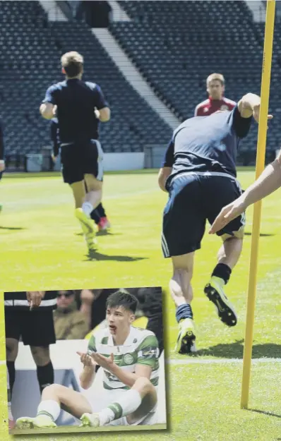  ??  ?? 0 Kieran Tierney wears a gumshield at training yesterday following his Scottish Cup final injury, inset.