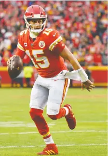  ?? PETER AIKEN/GETTY IMAGES ?? Chiefs QB Patrick Mahomes can beat you with both his powerful right arm and his ability to take off with the ball.