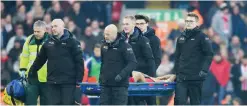  ??  ?? ANFIELD: Liverpool’s Philippe Coutinho is carried off the field on a stretcher after picking up an injury during their English Premier League soccer match against Sunderland at Anfield, Liverpool, England. —AP