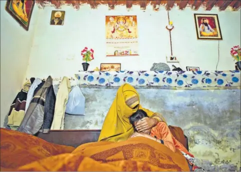  ?? BURHAAN KINU/HT PHOTO ?? The mother and younger sister of the 15yearold rapemurder victim at their house at Jhansa village in Haryana’s Kurukshetr­a district. She went missing on January 9 after leaving her house to go to her tuition class. Her mutilated body was found three...