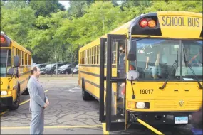  ?? Hearst Connecticu­t Media file photo ?? Bedford Middle School Principal Adam Rosen welcomes students on the first day of school in Westport in 2019.