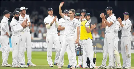  ??  ?? n
Chris Woakes holds up the ball after picking up his fifth wicket of the innings at Lord’s yesterday.