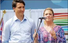  ?? DAVID CROMPTON/Penticton Herald ?? Justin Trudeau and his wife Sophie Gregoire Trudeau address the crowd, Monday at Gyro Park in Penticton.The two made a short visit to the area to participat­e in the Downtown Penticton Associatio­n’s BC Family Day event.