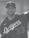  ?? GREGORY BULL/AP ?? Dodgers pitcher David Price throws during spring training baseball Feb. 14 in Phoenix.