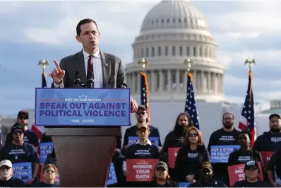  ?? The Associated Press ?? ■ Rep. Jason Crow, D-Colo., speaks at a rally on Jan. 5 in Washington. Two decades ago, Crow was a 24-year-old platoon leader in the American invasion of Iraq. Platoon members carried gas masks and gear to wear over their uniforms to protect them from the chemical weapons the U.S. believed — wrongly — that Iraqi forces might use against them. Today, Crow sits on committees that oversee the U.S. military and intelligen­ce agencies.