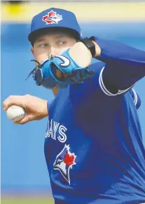  ?? FRANK FRANKLIN II/THE ASSOCIATED PRESS ?? Blue Jays’ Nate Pearson delivers during live batting practice at a workout Friday in Dunedin, Fla.