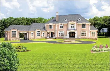  ?? BOTERO HOMES ?? A French Manor IV model home from Reston, Va.-based Botero Homes, a builder of huge houses.