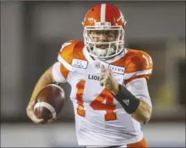  ?? The Canadian Press ?? B.C. Lions quarterbac­k Travis Lulay will be looking to lead his team into the CFL playoffs with a win over the Edmonton Eskimos tonight. Kickoff is 7 p.m. PT at B.C. Place.