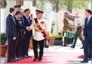  ??  ?? Jordan’s King Abdullah arrives for the opening of the third ordinary session of the 18th Parliament in Amman, yesterday.