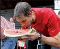  ?? Arkansas Democrat-Gazette/STEPHEN B. THORNTON ?? U.S. Sen. Mark Pryor (left photo) and U.S. Rep. Tom Cotton munch on slices during the Politicall­y Correct Watermelon Eating Contest on Saturday morning at the Hope Watermelon Festival.