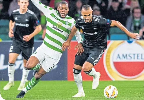  ??  ?? Olivier Ntcham competes with Rosenborg’s Issam Jebali in the reverse fixture at Celtic Park in September