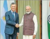  ?? PTI ?? Prime Minister Narendra Modi and Argentina's President Mauricio Macri shake hands prior to a meeting in New Delhi on Monday