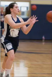  ??  ?? Conway Christian’s Marlie Moix reaches for a pass during preseason drills.