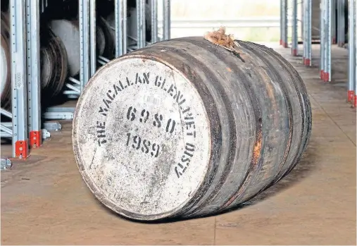  ??  ?? SCOTCH: Stored at the Macallan Distillery’s warehouse, the cask number 6980 is expected to yield 261 bottles valued at around £1,700 each