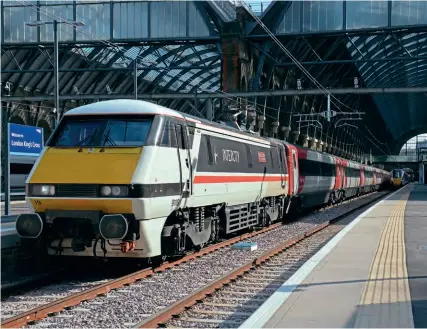  ?? ?? Class 91s are back in favour on the East Coast Main Line, with an increasing number back in service with LNER as the rail network gets busier following the lifting of coronaviru­s restrictio­ns earlier in the summer. Intercity liveried 91119 Bounds Green Intercity Depot 1977-2017 awaits departure, ready to haul 1D21, the 16.03 London King’s Cross to Leeds service on September 16. Brad Joyce.