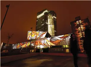  ?? (Kai Pfaffenbac­h/Reuters) ?? THE EUROPEAN Central Bank headquarte­rs is illuminate­d in March in Frankfurt.